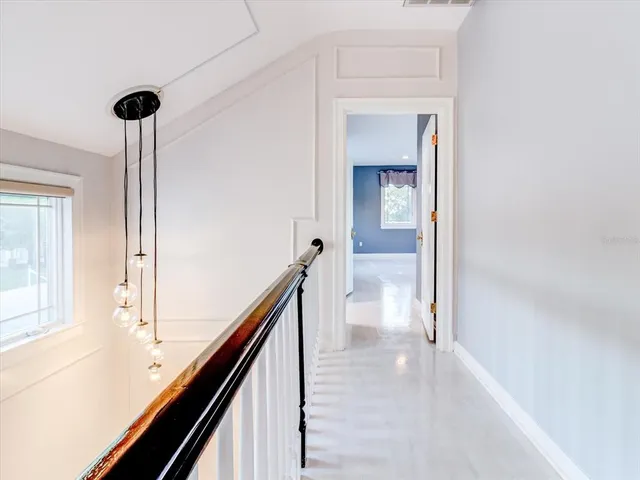a kitchen with granite countertop a sink and a stove top oven