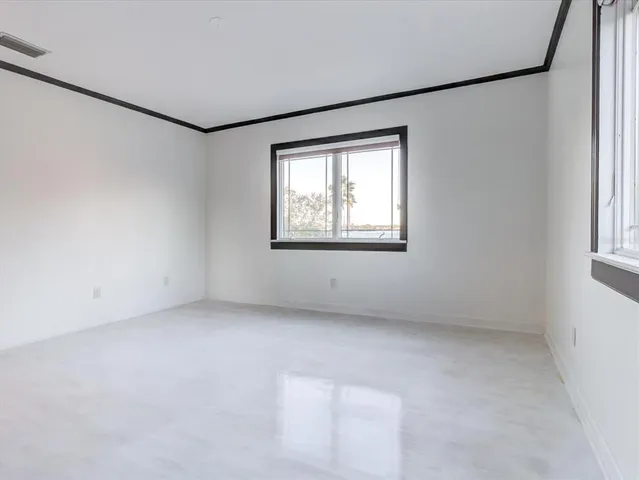 an aerial view of a houses with outdoor space