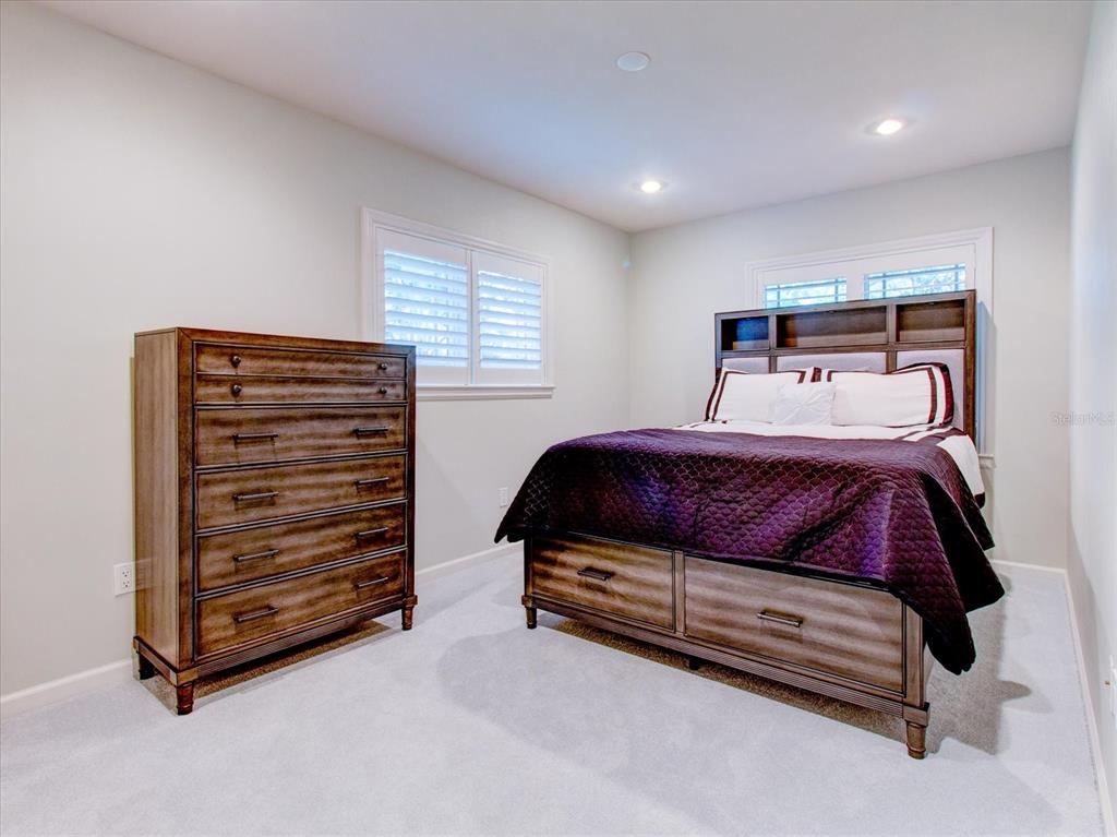 518 Riverside Drive Tarpon Springs, FL 34689 - Photo 58 of 82 a bedroom with a bed and a window