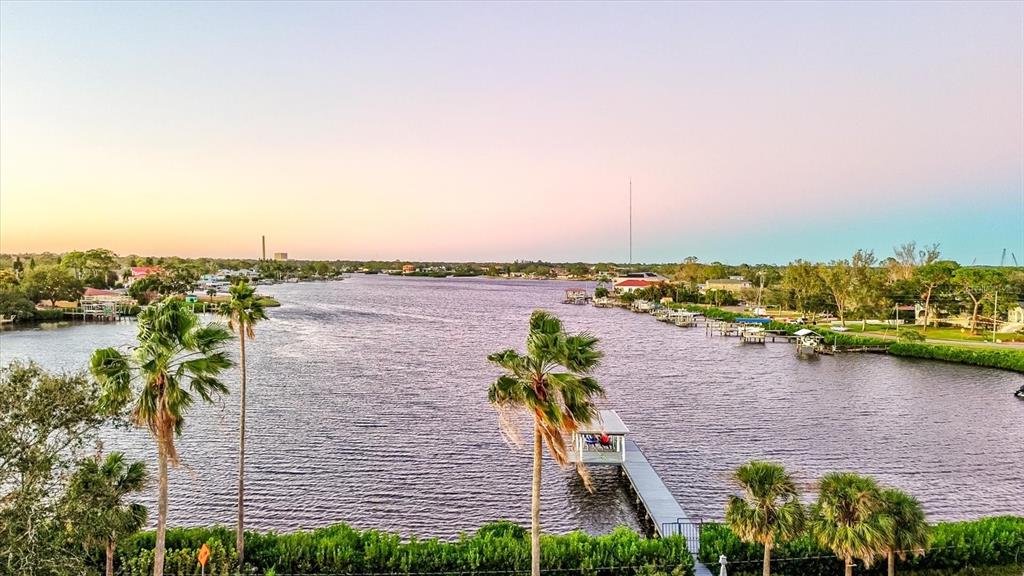 518 Riverside Drive Tarpon Springs, FL 34689 - Photo 64 of 82 an aerial view of ocean with residential house with outdoor space