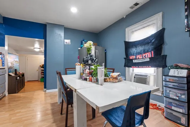 a view of a dining room with furniture