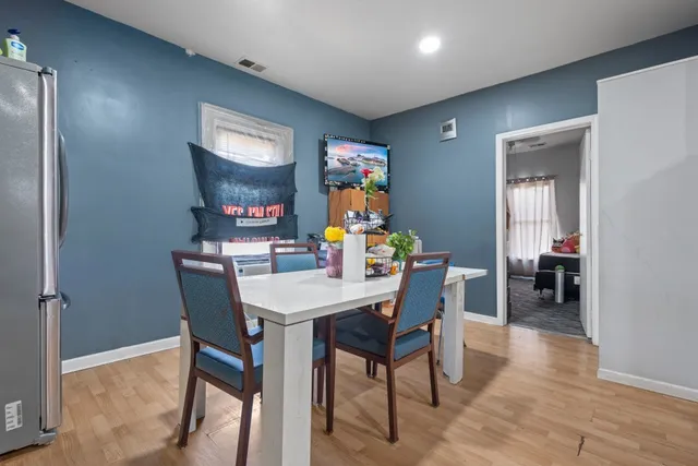 a view of a dining room with furniture