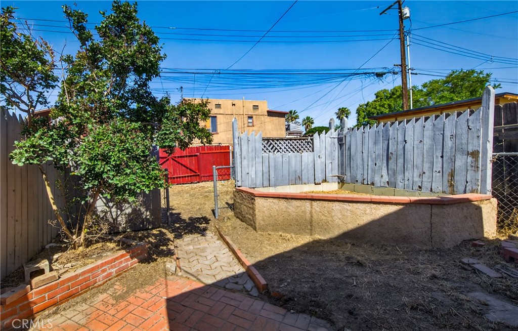299 North 3rd Street Banning, CA 92220 - Photo 19 of 21 Back yard and Alley Gate