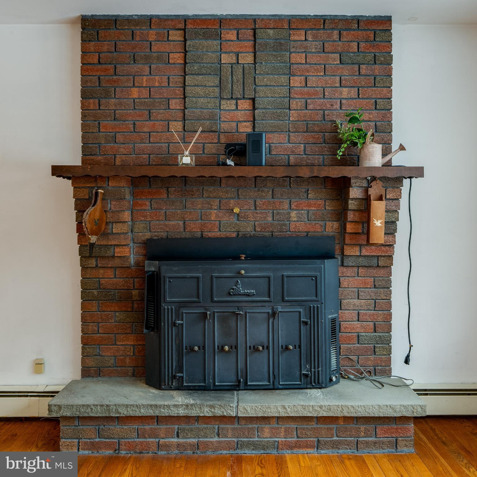 203 Alleghenyville Road Mohnton, PA 19540 - Photo 11 of 37 Charming brick fireplace with rustic accents.