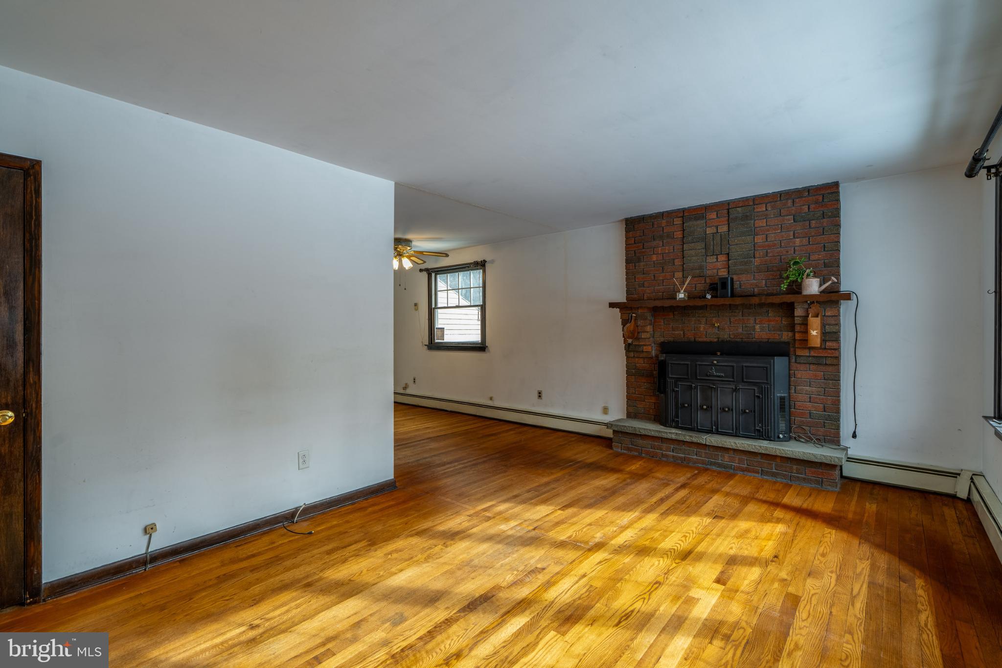 203 Alleghenyville Road Mohnton, PA 19540 - Photo 9 of 37 Spacious living area with warm wood floors.