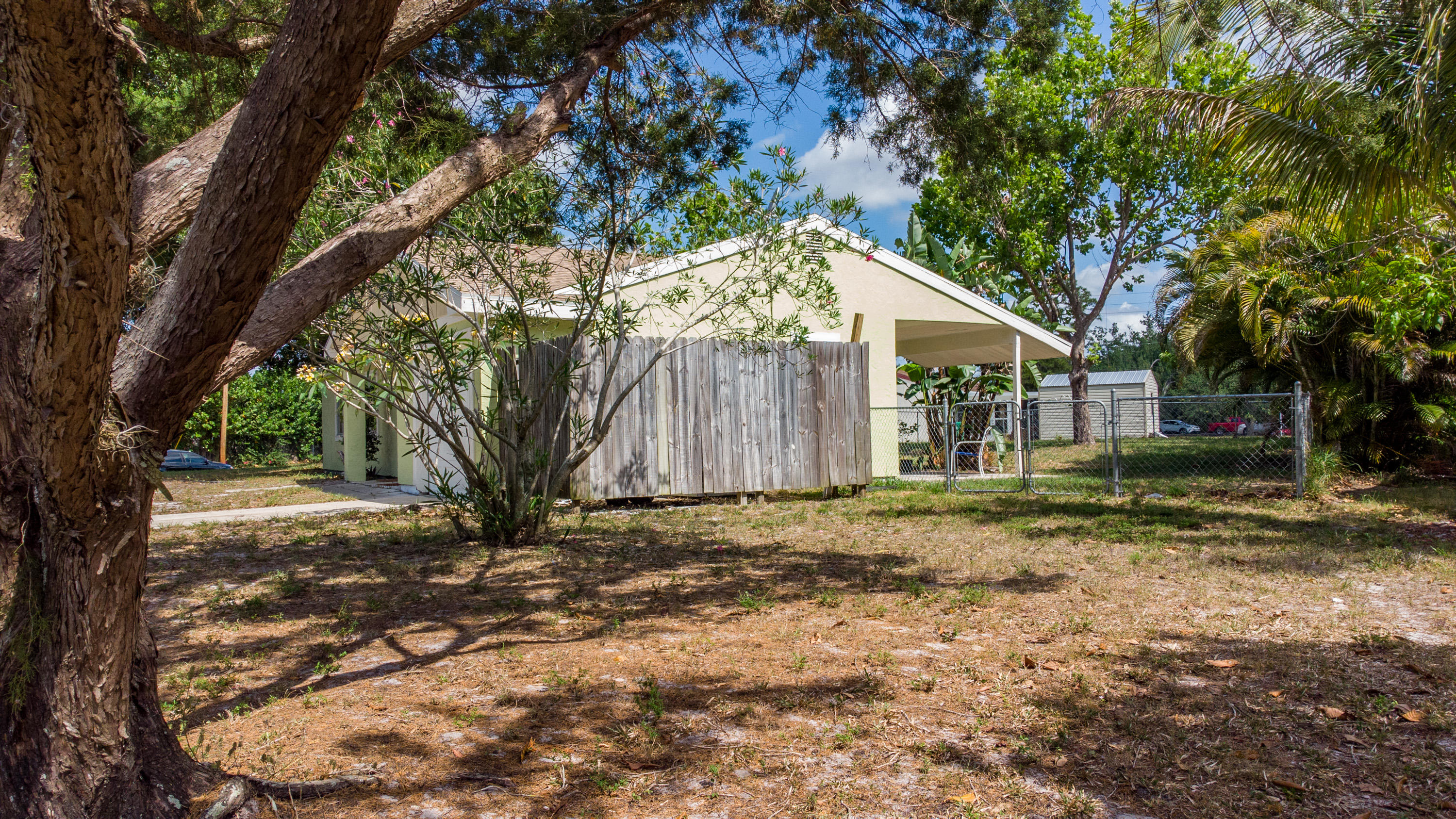 391 Southwest Homeland Road Port St. Lucie, FL 34953 - Photo 31 of 46 Side