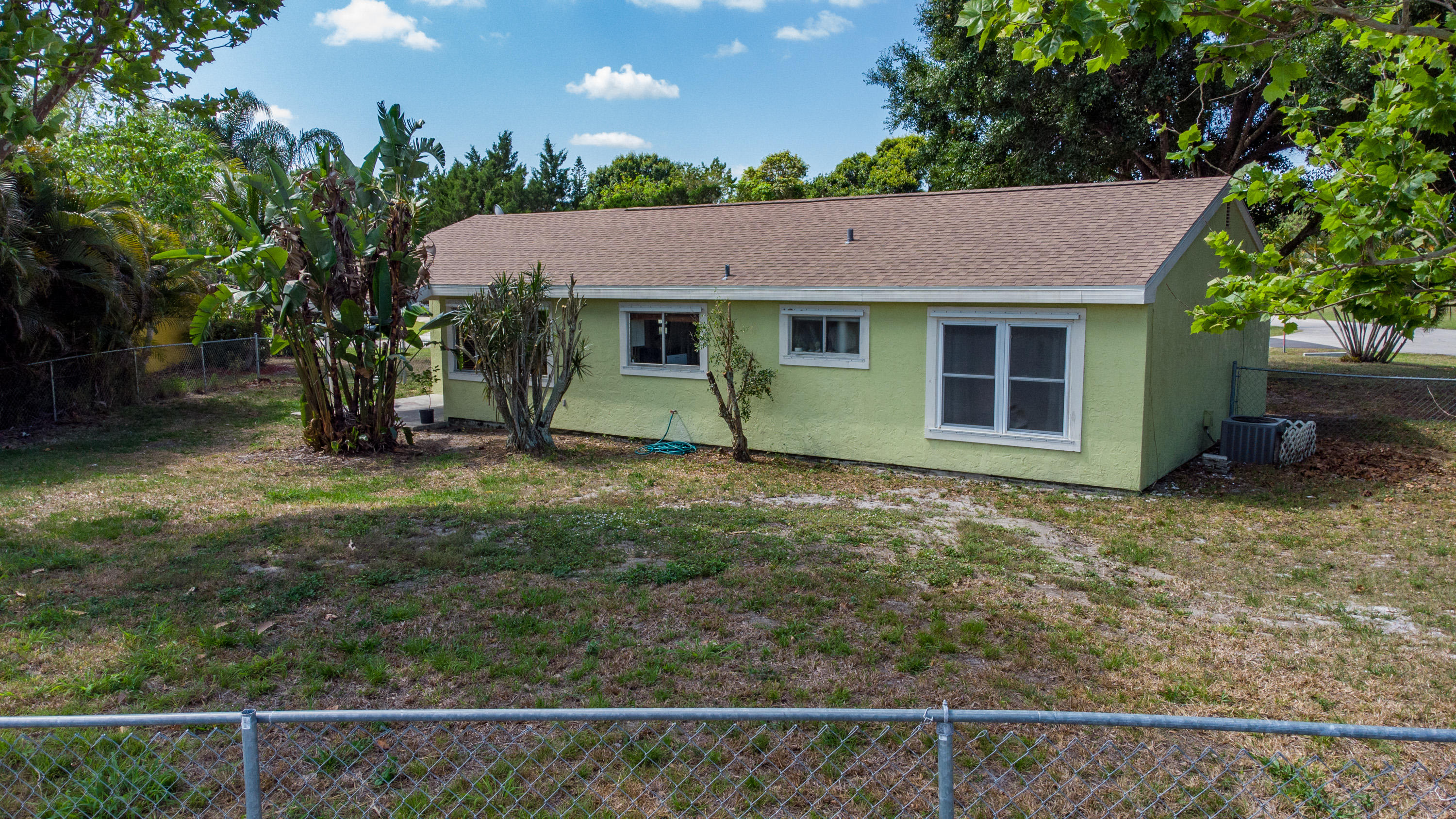 391 Southwest Homeland Road Port St. Lucie, FL 34953 - Photo 35 of 46 Fenced in back yard
