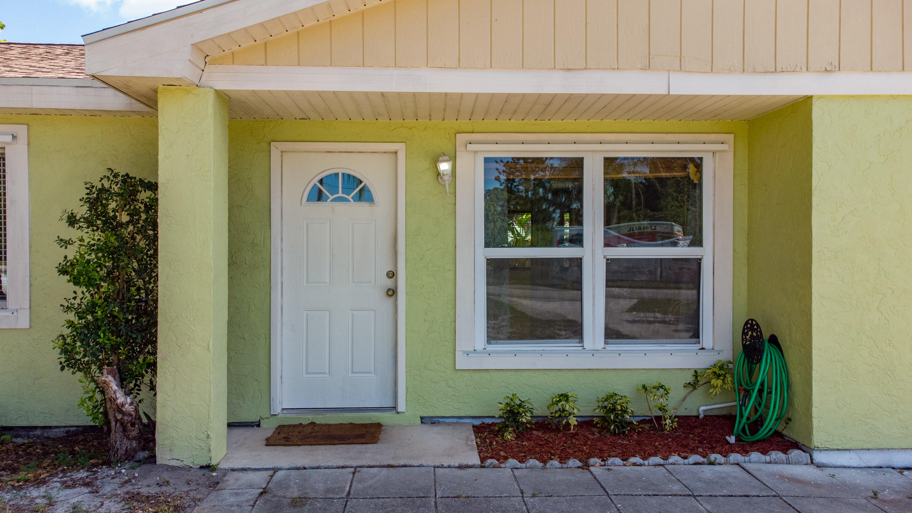 391 Southwest Homeland Road Port St. Lucie, FL 34953 - Photo 38 of 46 Front entrance