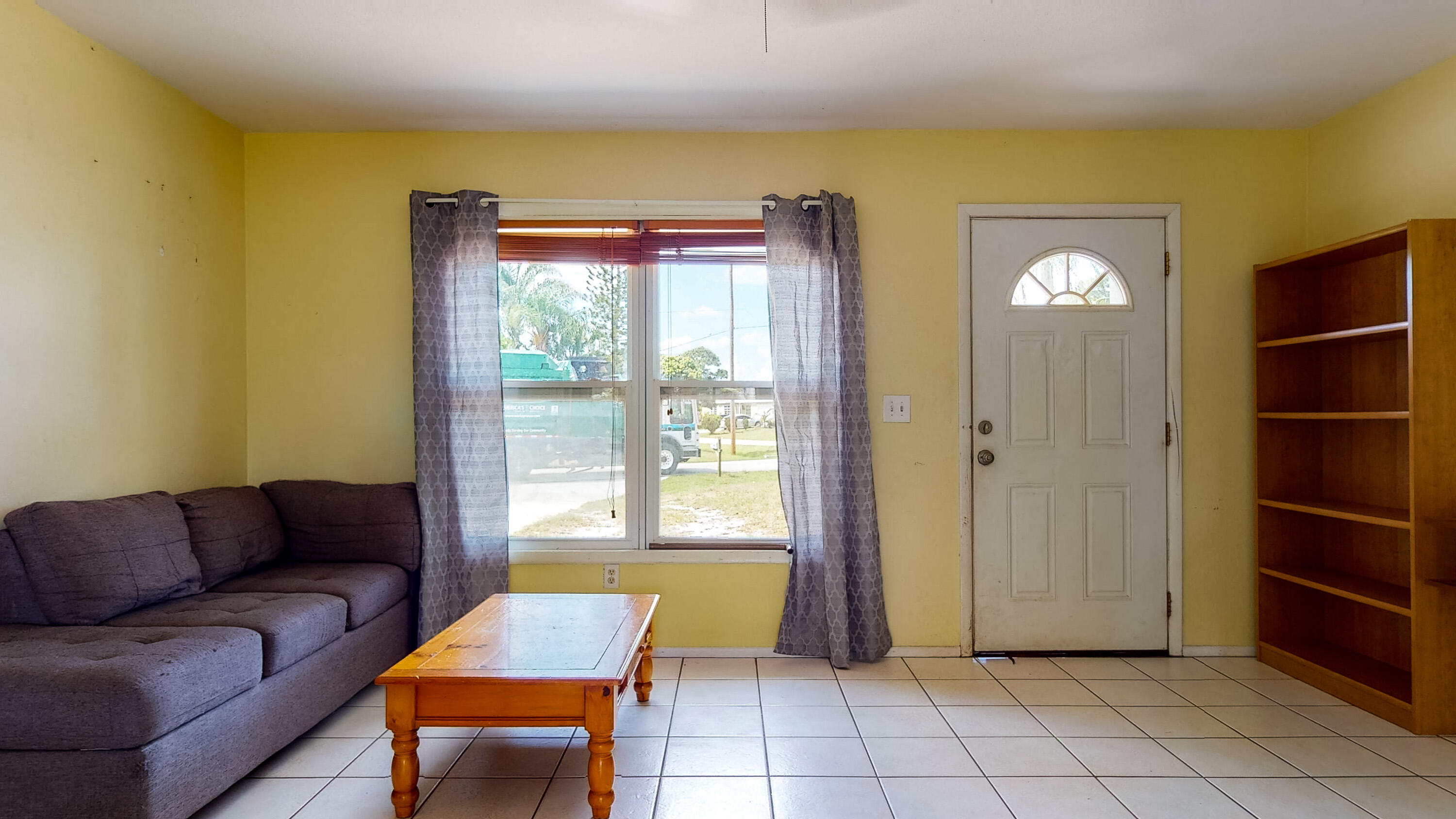391 Southwest Homeland Road Port St. Lucie, FL 34953 - Photo 4 of 46 Living area/front door