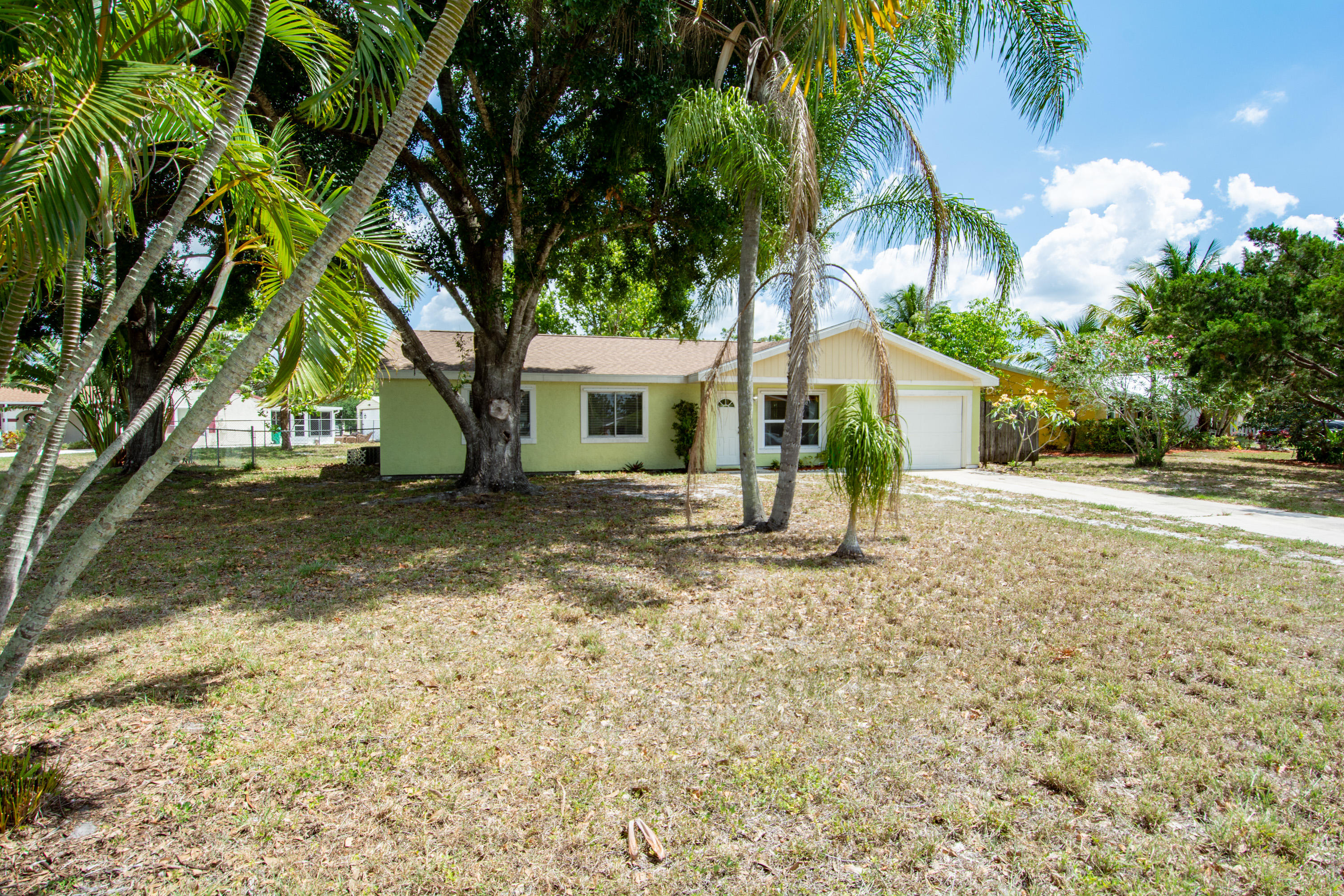 391 Southwest Homeland Road Port St. Lucie, FL 34953 - Photo 45 of 46 front yard