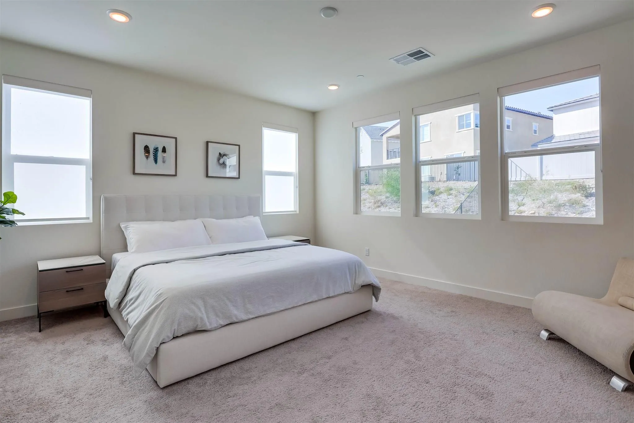 8922 Trailridge Avenue Santee, CA 92071 - Photo 16 of 31 a spacious bedroom with a bed and a couch