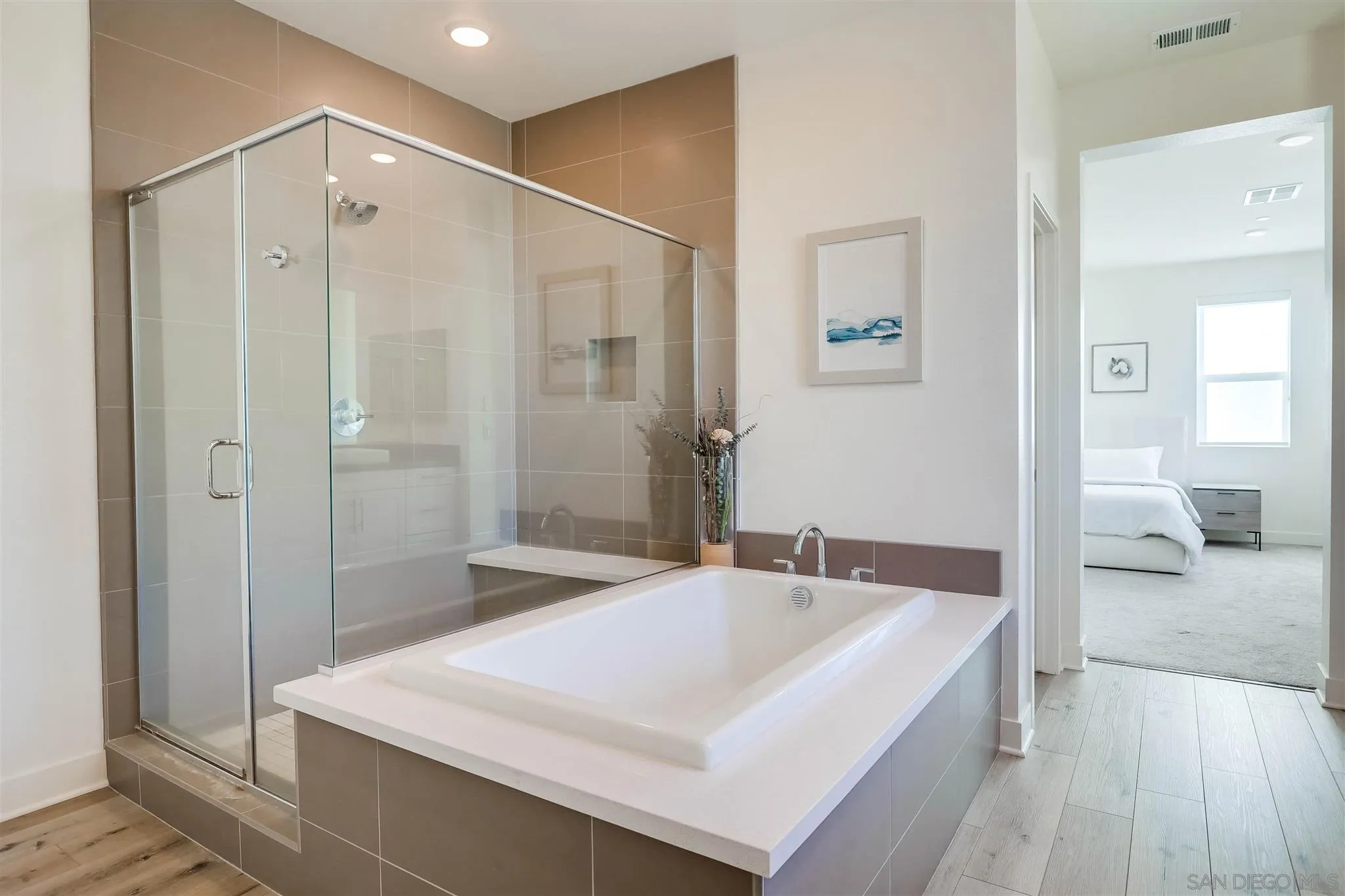 8922 Trailridge Avenue Santee, CA 92071 - Photo 20 of 31 a en suite bathroom with a granite countertop tub sink and shower