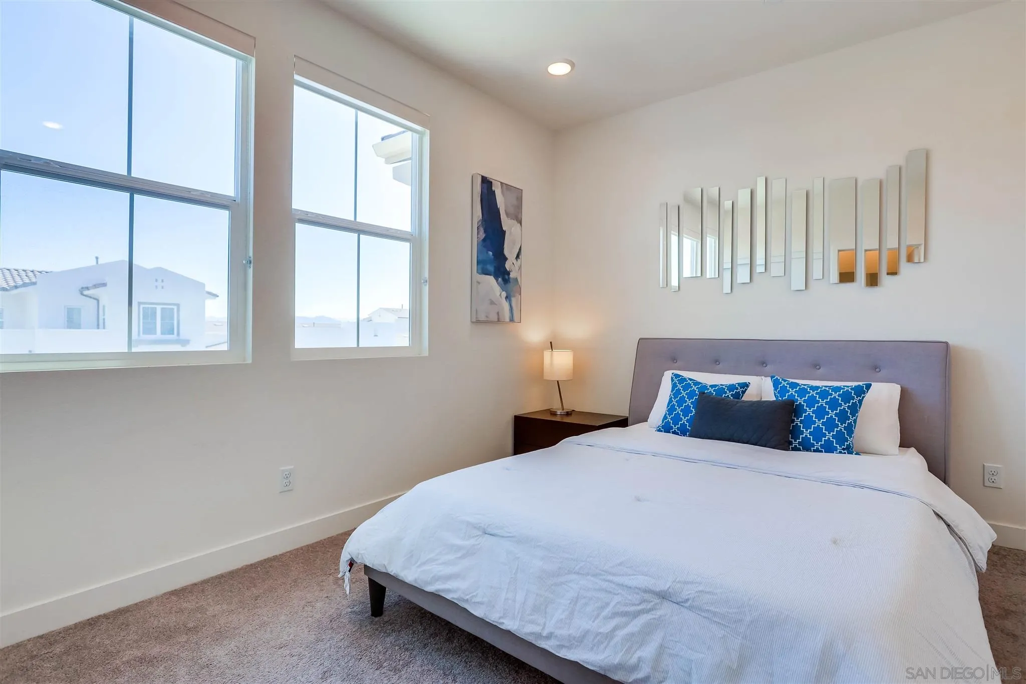 8922 Trailridge Avenue Santee, CA 92071 - Photo 21 of 31 a bedroom with a large bed and a window