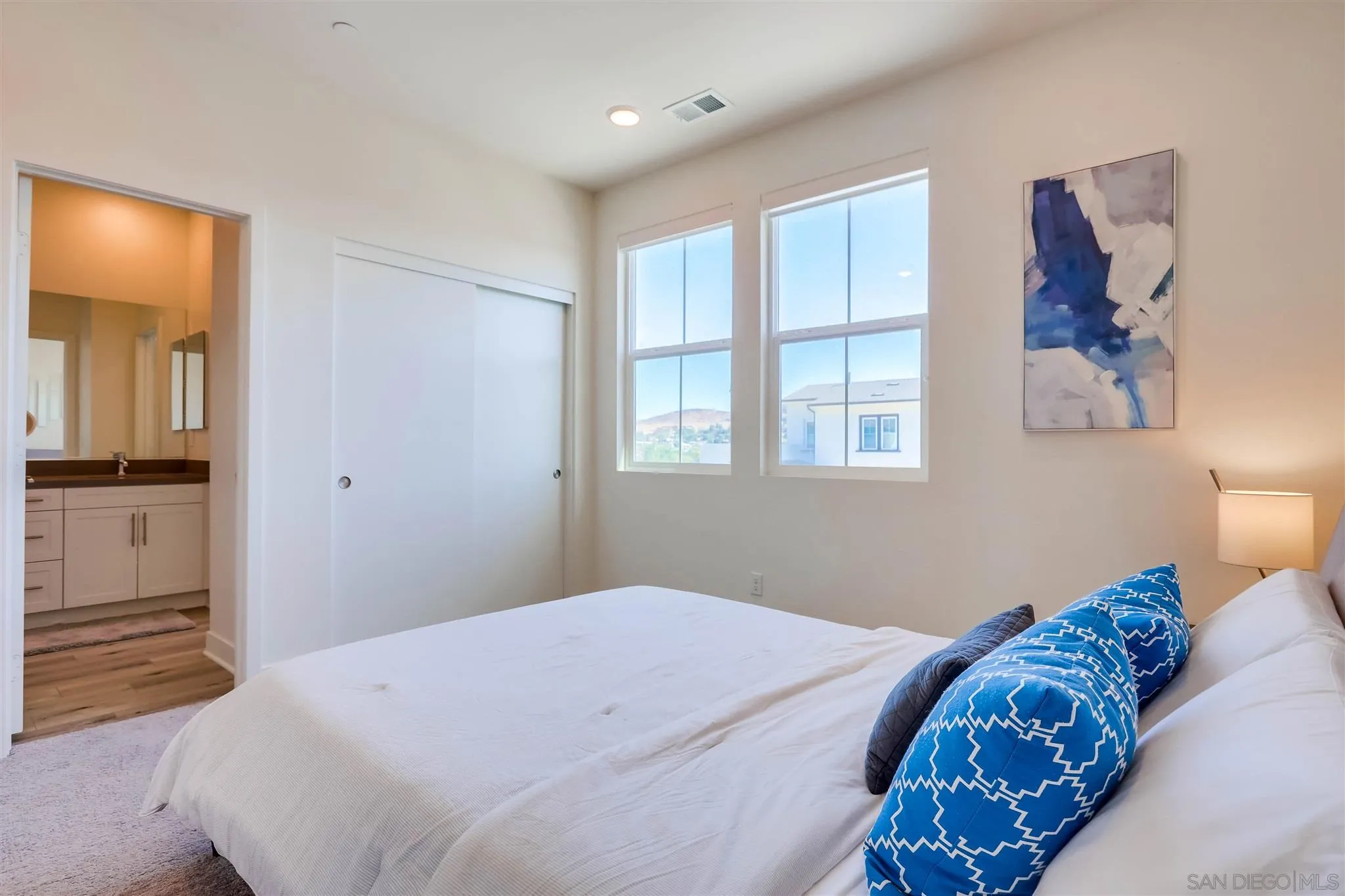 8922 Trailridge Avenue Santee, CA 92071 - Photo 22 of 31 a bedroom with a bed and a window