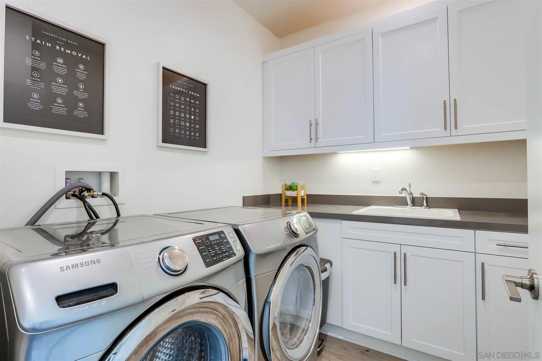 8922 Trailridge Avenue Santee, CA 92071 - Photo 25 of 31 a utility room with dryer and washer