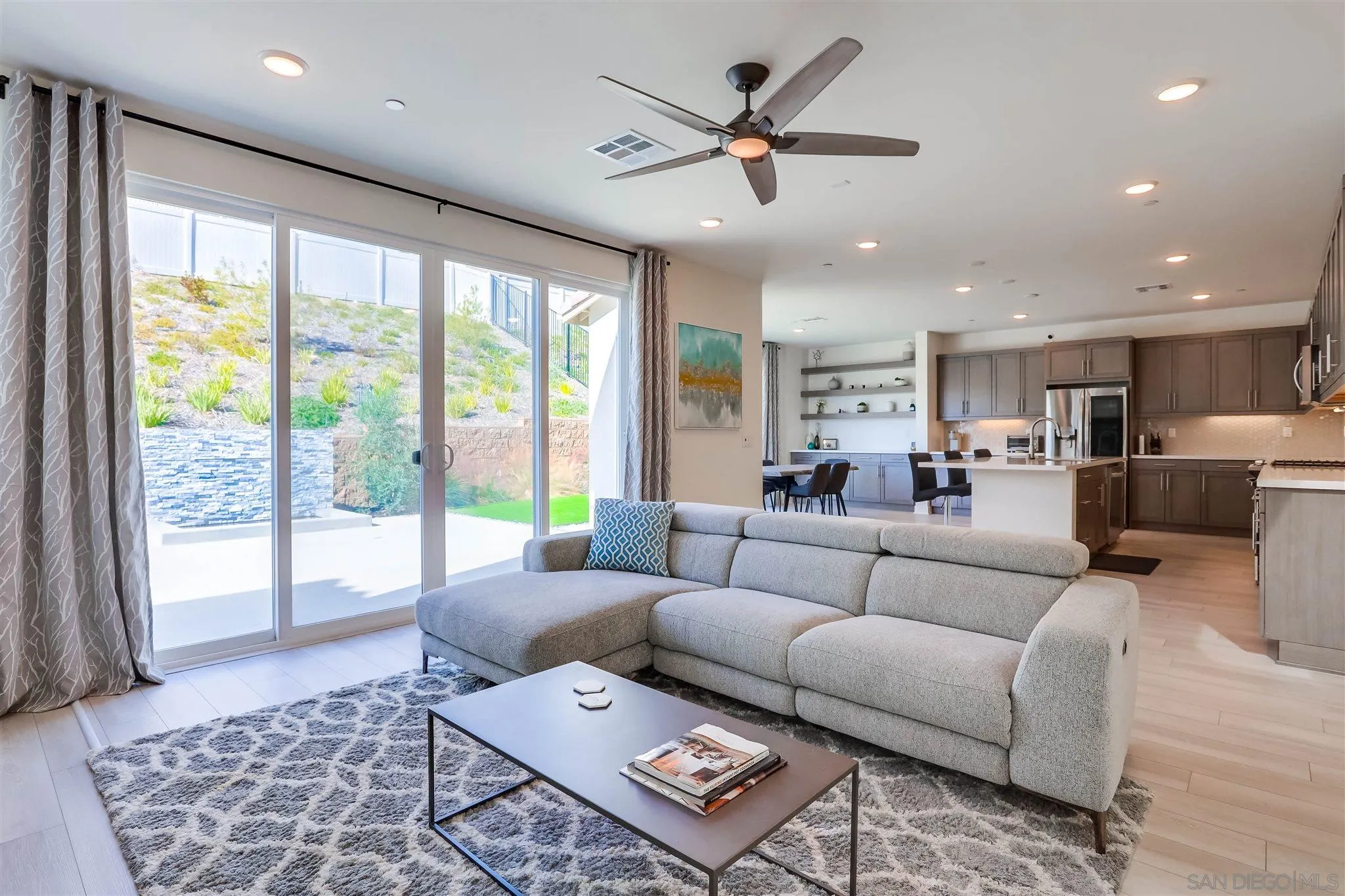 8922 Trailridge Avenue Santee, CA 92071 - Photo 6 of 31 a living room with furniture and a large window