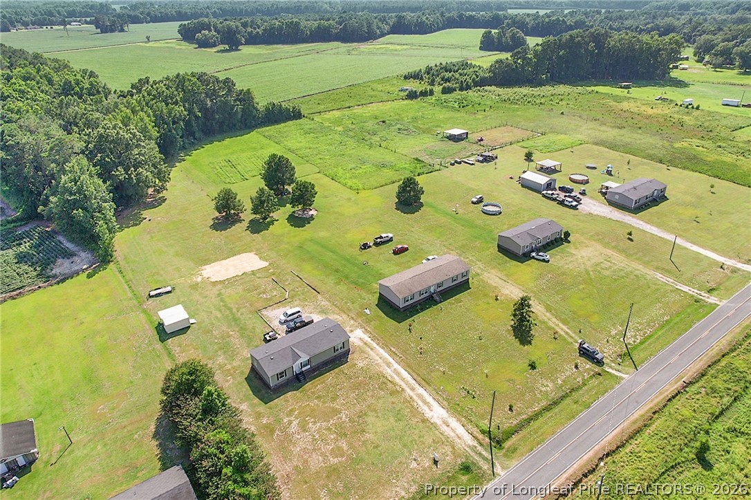 2452 Progressive Farm Road Fairmont, NC 28340 - Photo 37 of 39 a view of swimming pool with a yard
