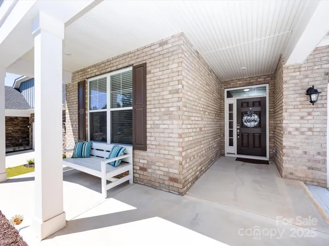 a view of a entryway door front of house