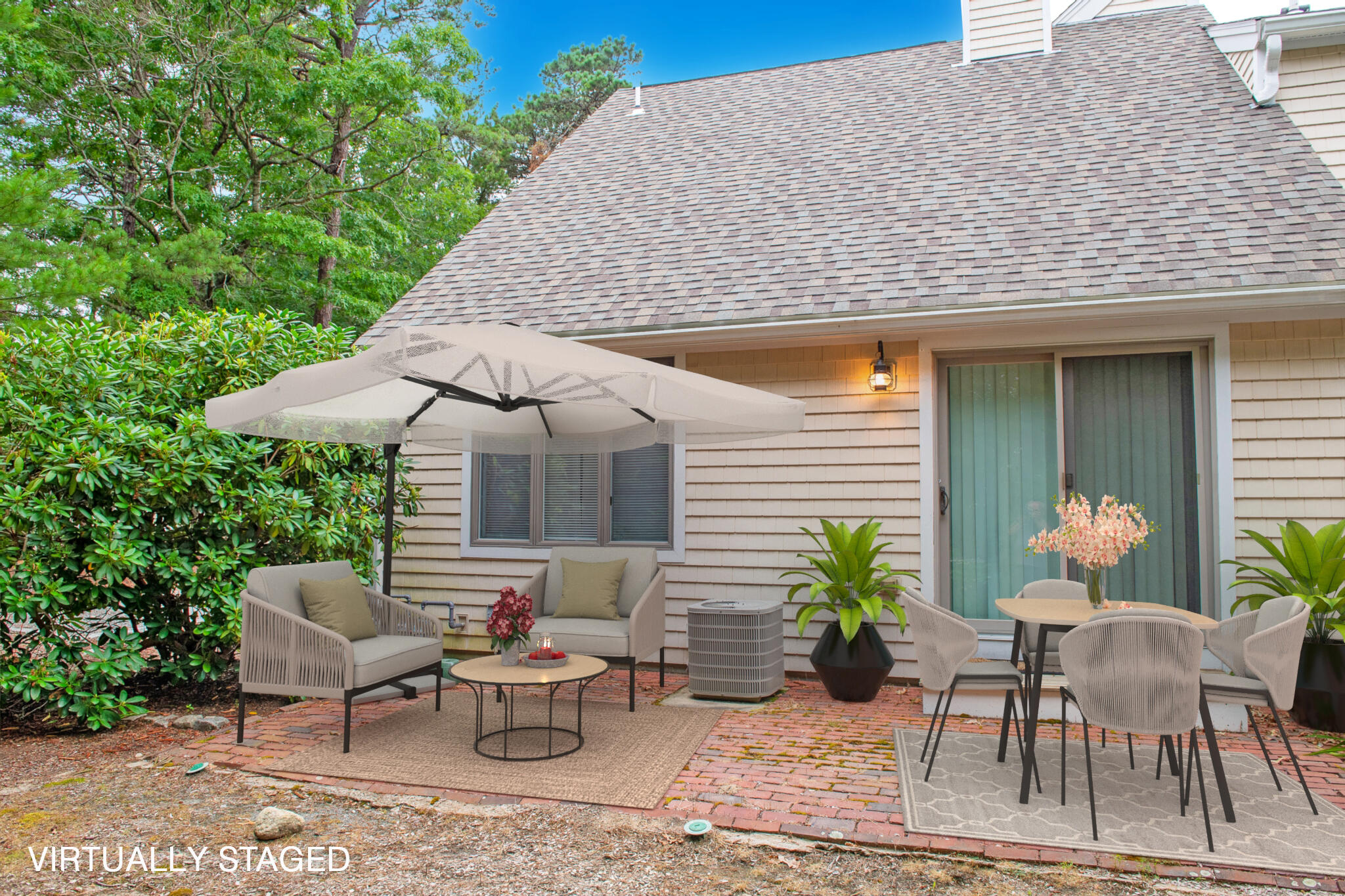 1 Shellback Way, Unit A1 Mashpee, MA 02649 - Photo 1 of 42 a view of a chairs and table in patio