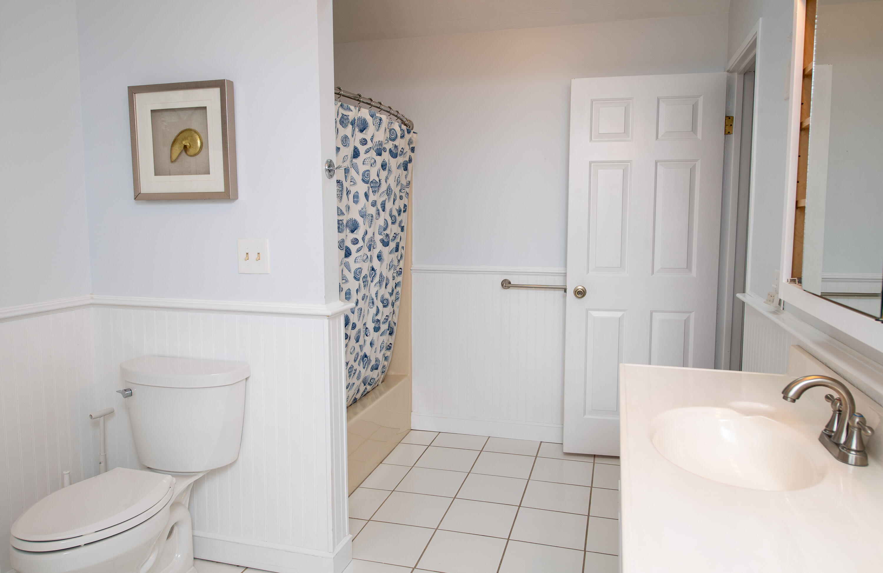 1 Shellback Way, Unit A1 Mashpee, MA 02649 - Photo 22 of 42 a bathroom with a sink a toilet and shower