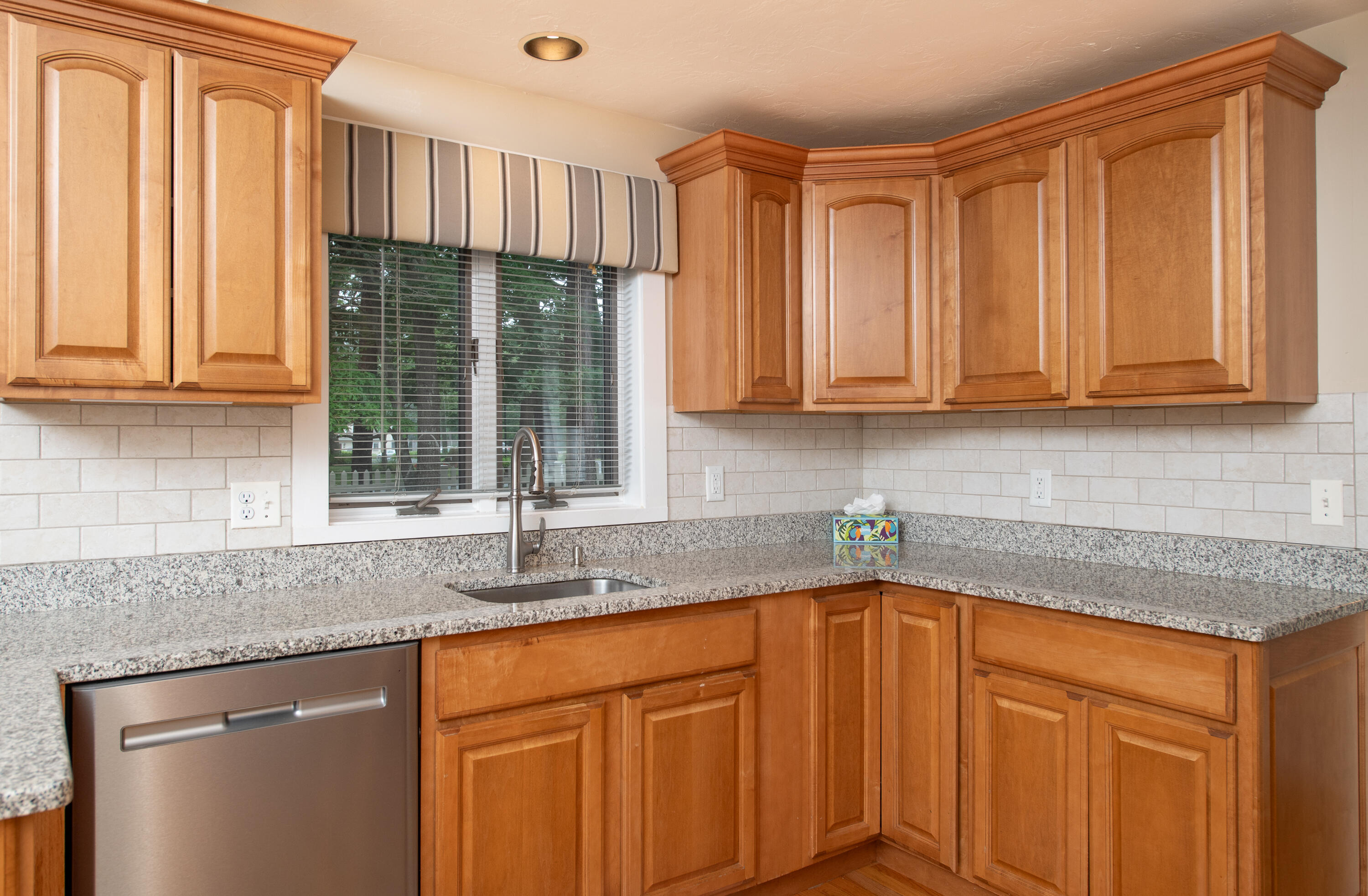 1 Shellback Way, Unit A1 Mashpee, MA 02649 - Photo 9 of 42 a kitchen with stainless steel appliances granite countertop a sink and cabinets