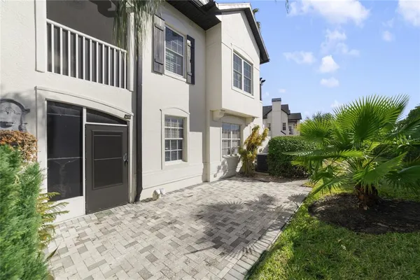 a view of a house with a street