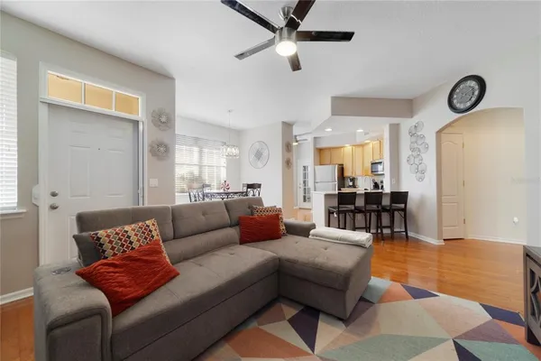 a living room with furniture and a table