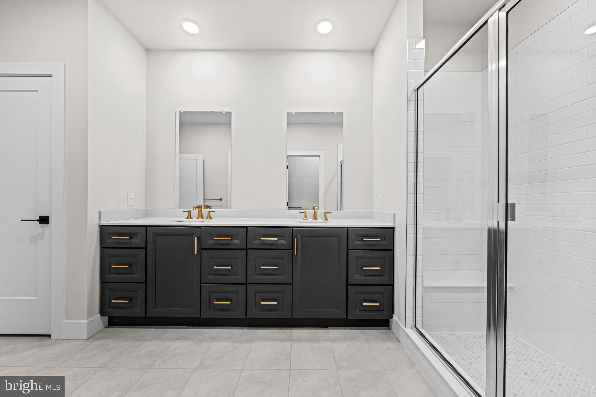 133 Alroy Road Malvern, PA 19355 - Photo 26 of 48 Sleek modern bathroom with elegant finishes.