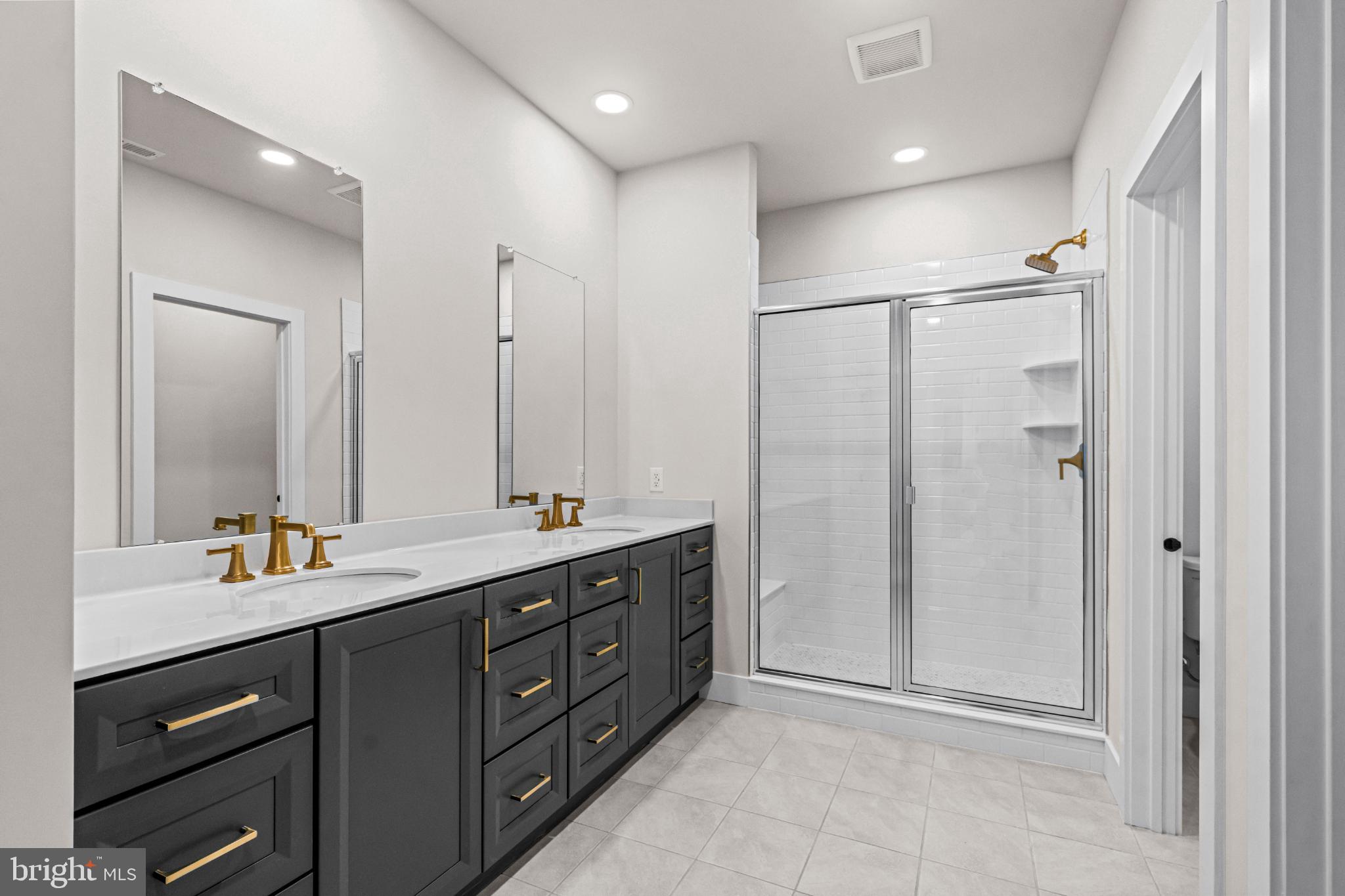 133 Alroy Road Malvern, PA 19355 - Photo 27 of 48 Sleek modern bathroom with elegant finishes.