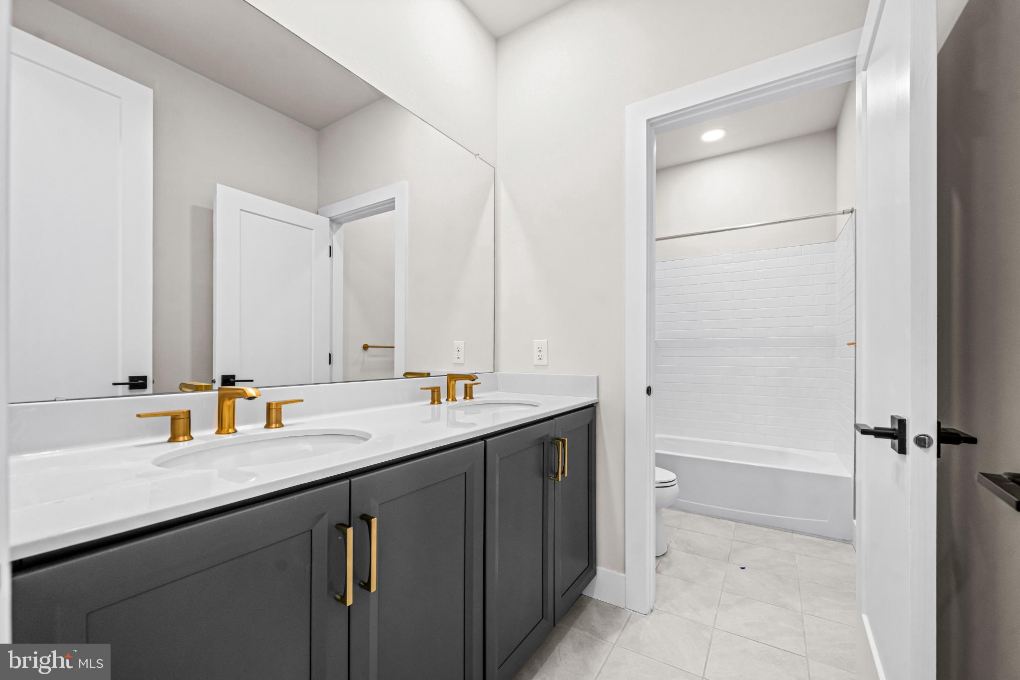 133 Alroy Road Malvern, PA 19355 - Photo 30 of 48 Sleek modern bathroom with elegant finishes.