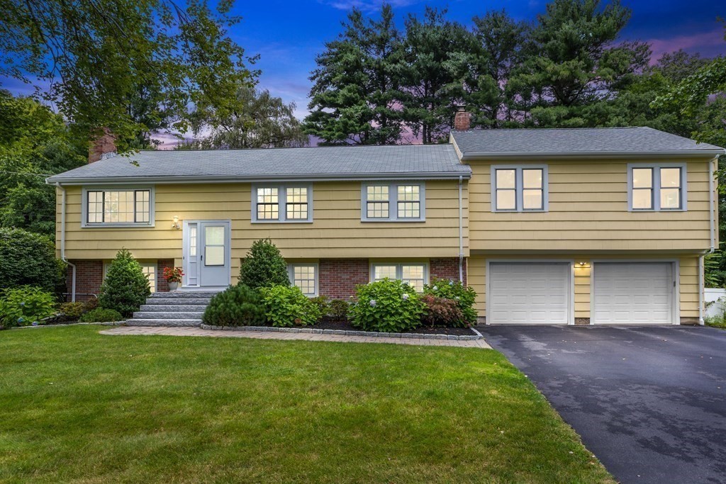 26 Alta Road Sudbury, MA 01776 - Photo 1 of 37 a front view of a house with a yard