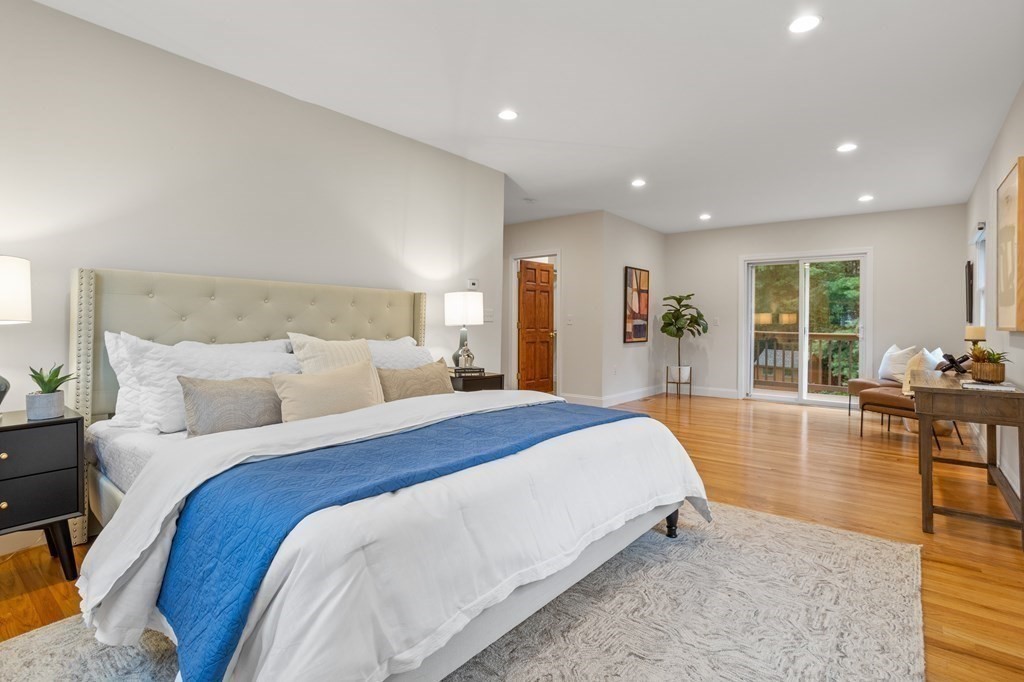 26 Alta Road Sudbury, MA 01776 - Photo 11 of 37 a bed room with a bed and glass table