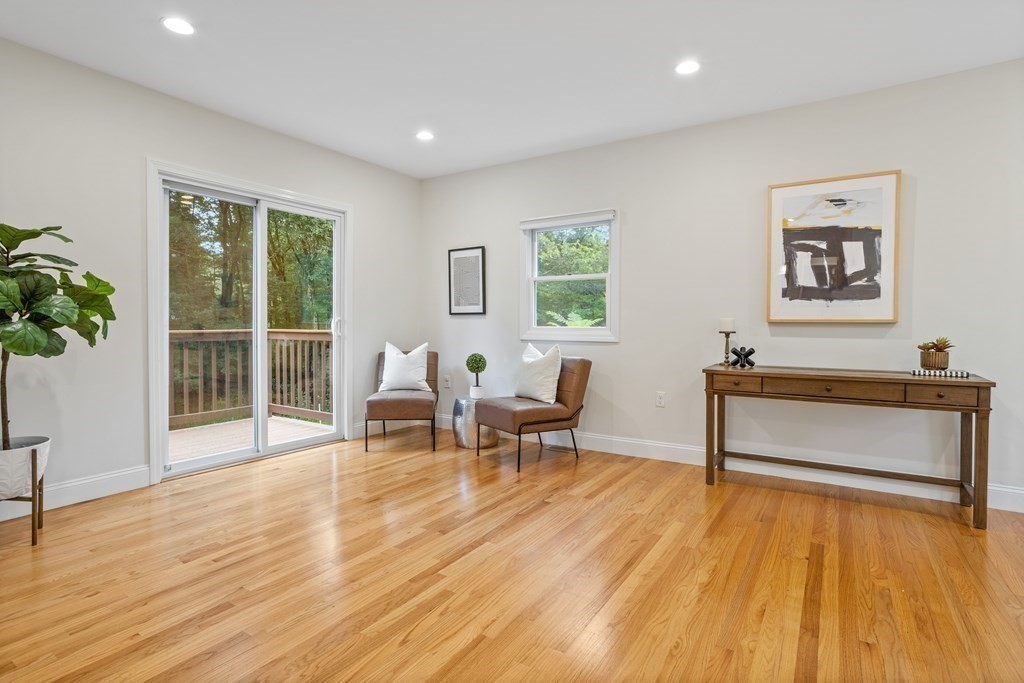 26 Alta Road Sudbury, MA 01776 - Photo 13 of 37 a living room with furniture and a wooden floor