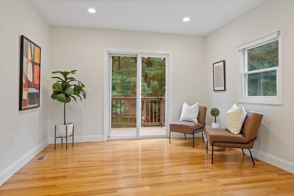 26 Alta Road Sudbury, MA 01776 - Photo 14 of 37 a living room with furniture and a potted plant