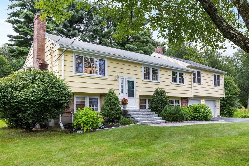 26 Alta Road Sudbury, MA 01776 - Photo 2 of 37 a view of a house with a yard potted plants and a large tree