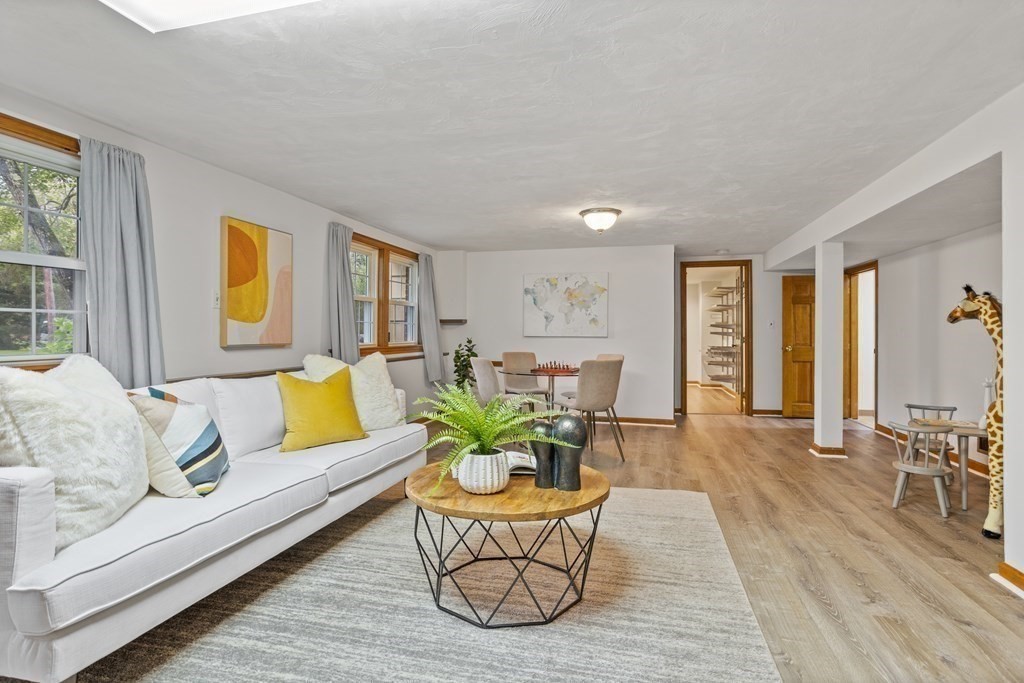 26 Alta Road Sudbury, MA 01776 - Photo 23 of 37 a living room with furniture and a large window