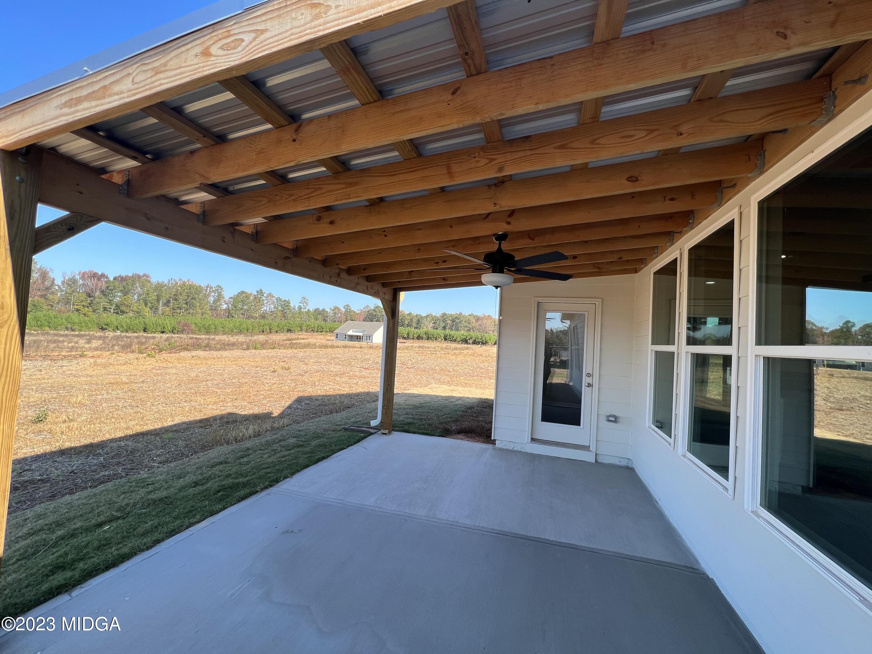 159 Sanders Road Macon, GA 31210 - Photo 31 of 40 a view of a porch next to a yard
