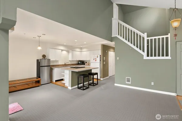 a view of kitchen and kitchen with furniture