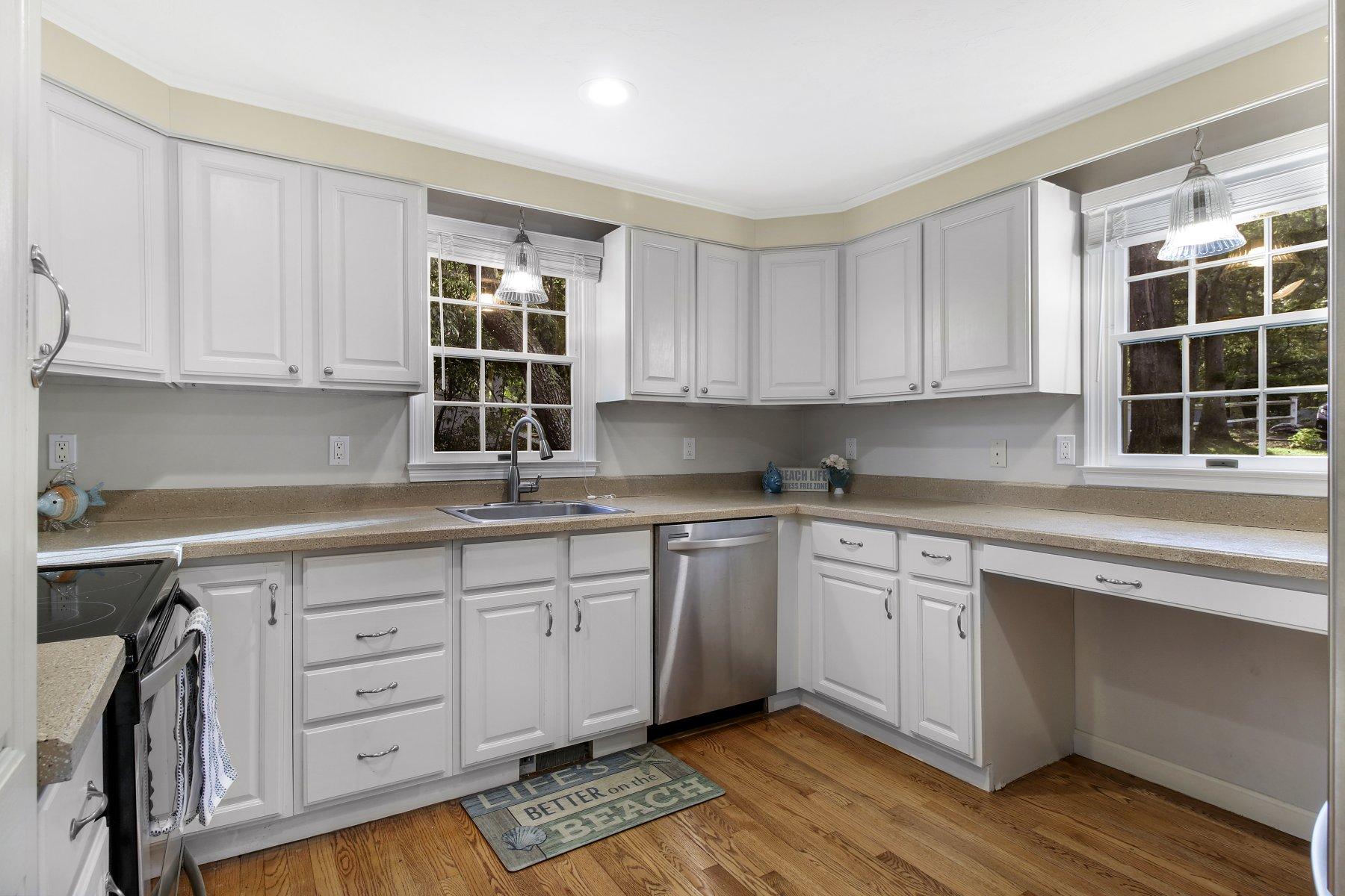 22 Quaker Run Road Mashpee, MA 02649 - Photo 23 of 34 a kitchen with granite countertop cabinets and window