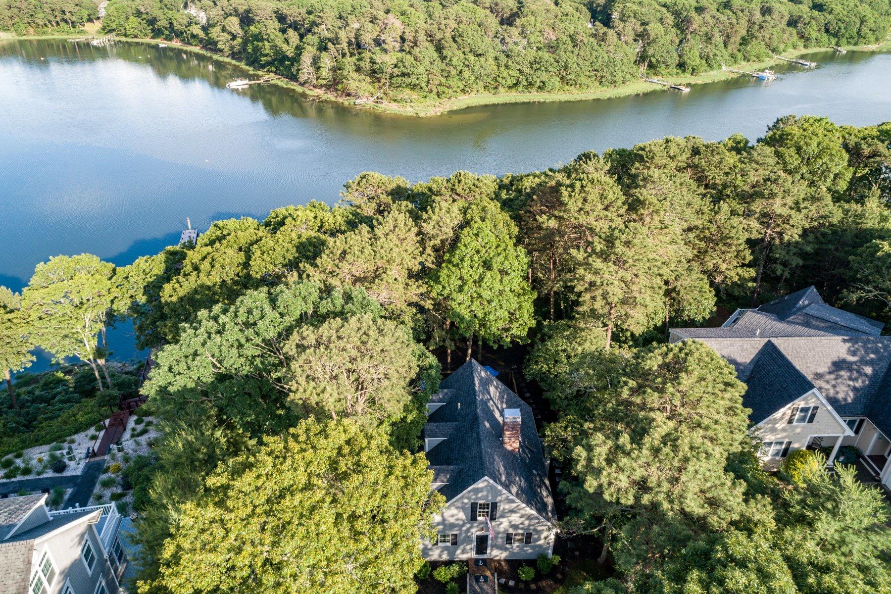22 Quaker Run Road Mashpee, MA 02649 - Photo 34 of 34 an aerial view of a houses with a lake view