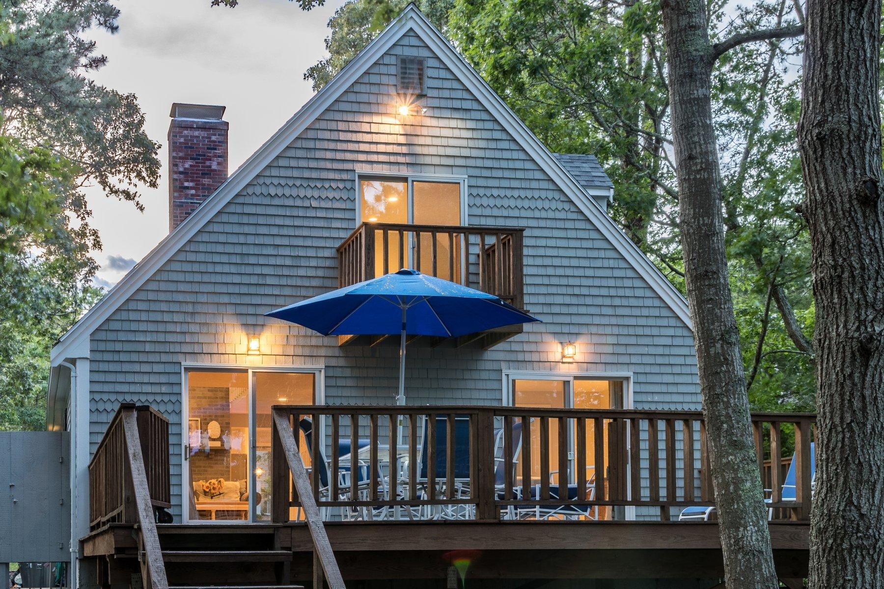 22 Quaker Run Road Mashpee, MA 02649 - Photo 5 of 34 a view of a wooden deck with furniture