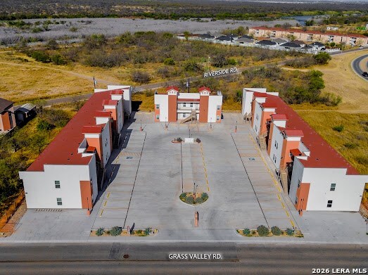 118 Grass Valley Road, Unit 208 Eagle Pass, TX 78852 - Photo 18 of 28 an aerial view of a house with lake view