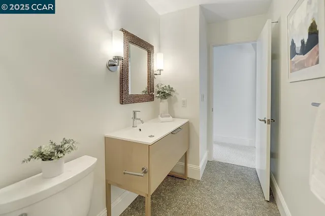 a view of storage and utility room with washer and dryer