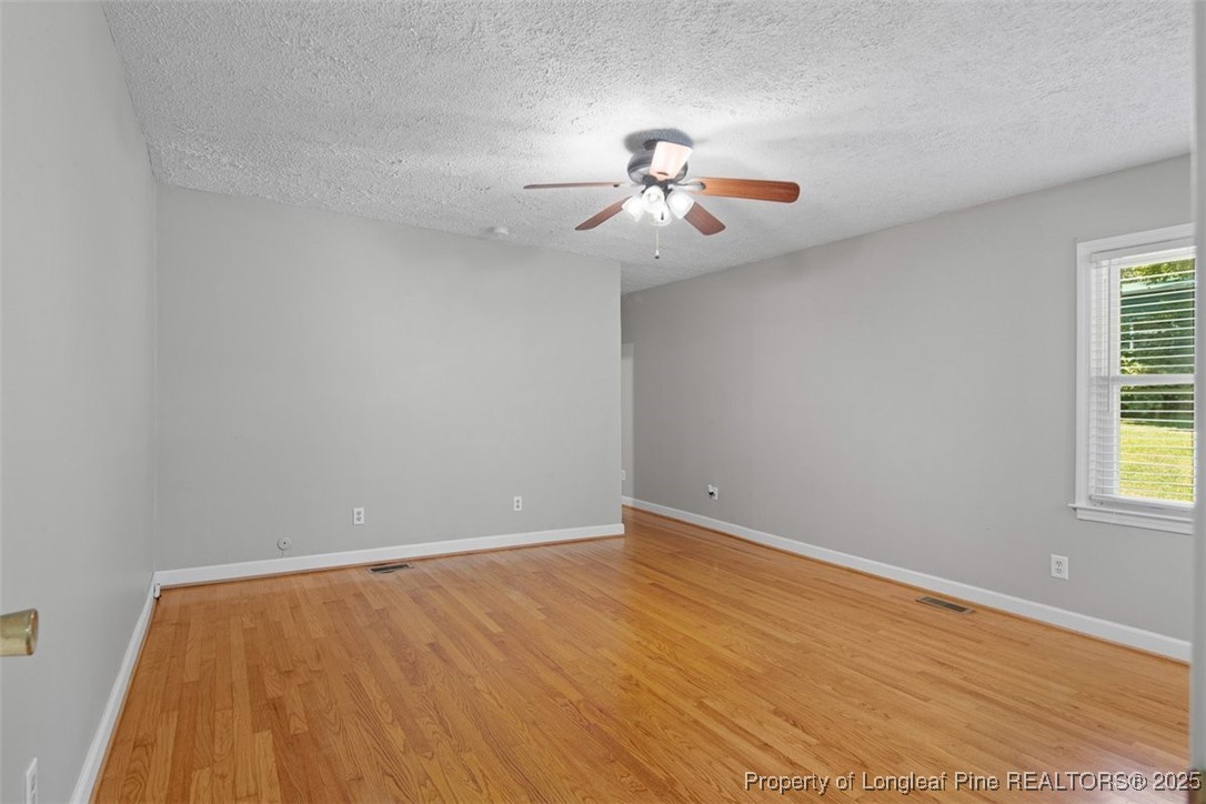 2434 North Bragg Boulevard Spring Lake, NC 28390 - Photo 23 of 44 an empty room with a window