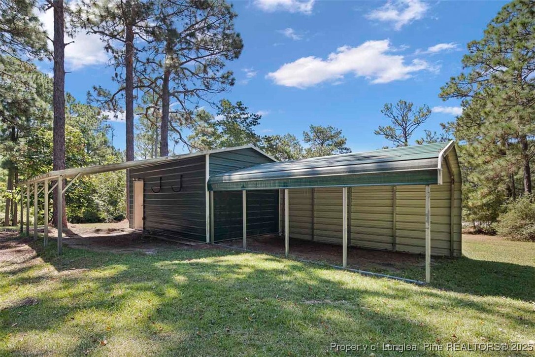 2434 North Bragg Boulevard Spring Lake, NC 28390 - Photo 38 of 44 front view of a house with a yard