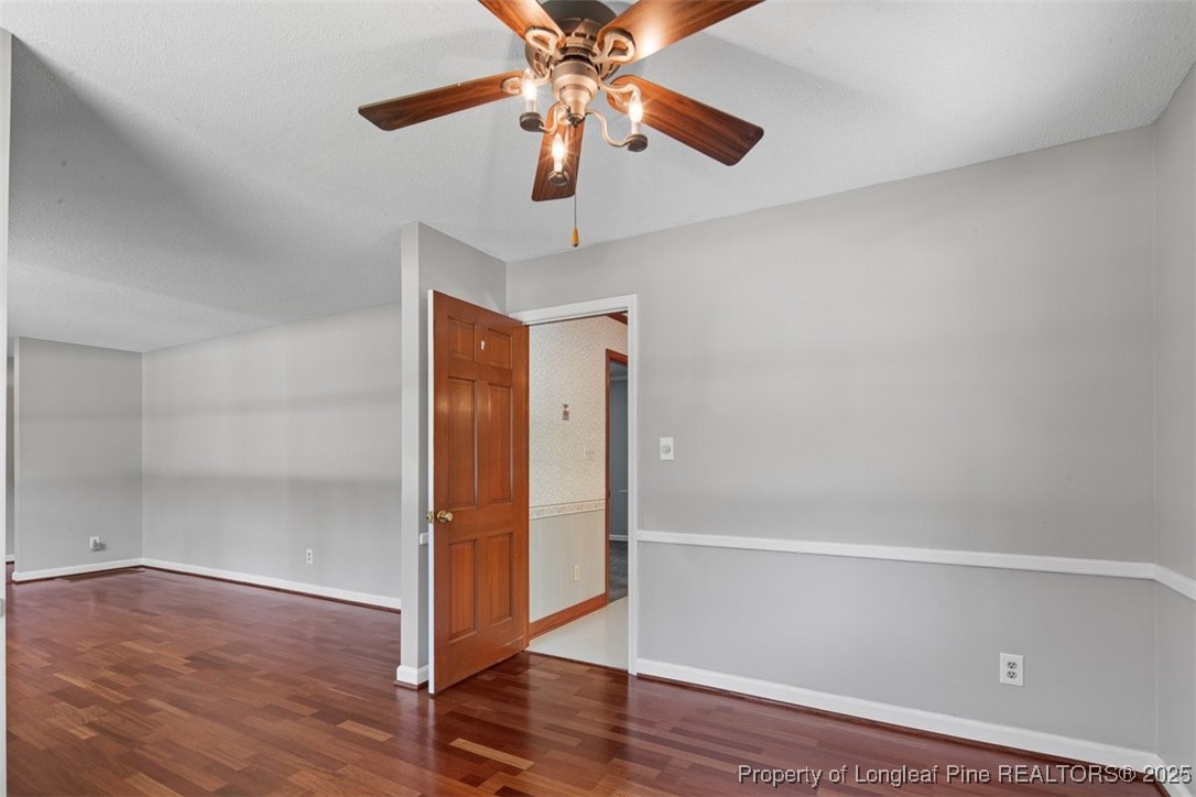 2434 North Bragg Boulevard Spring Lake, NC 28390 - Photo 9 of 44 a view of empty room with wooden floor