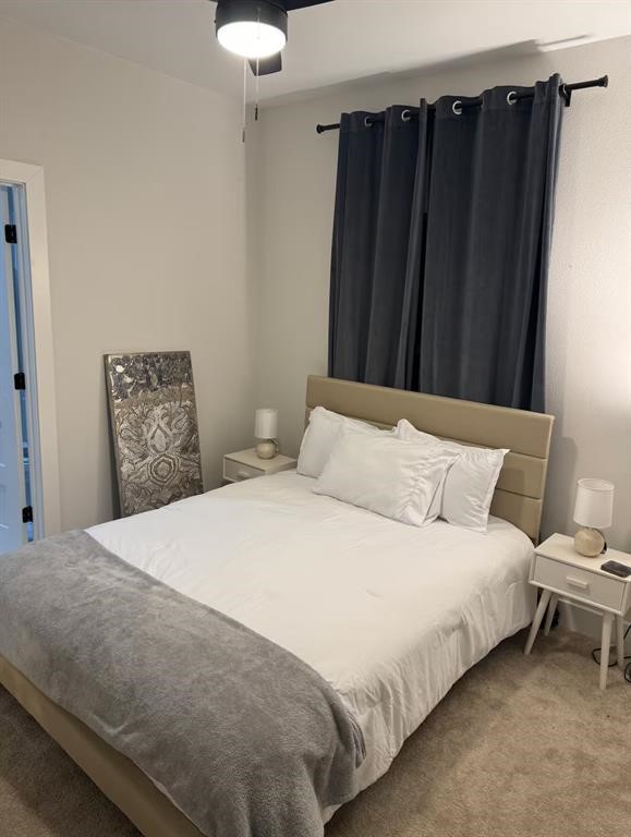 3610 Dreyfus Street, Unit A Houston, TX 77021 - Photo 18 of 20 a bedroom with a bed and a dresser
