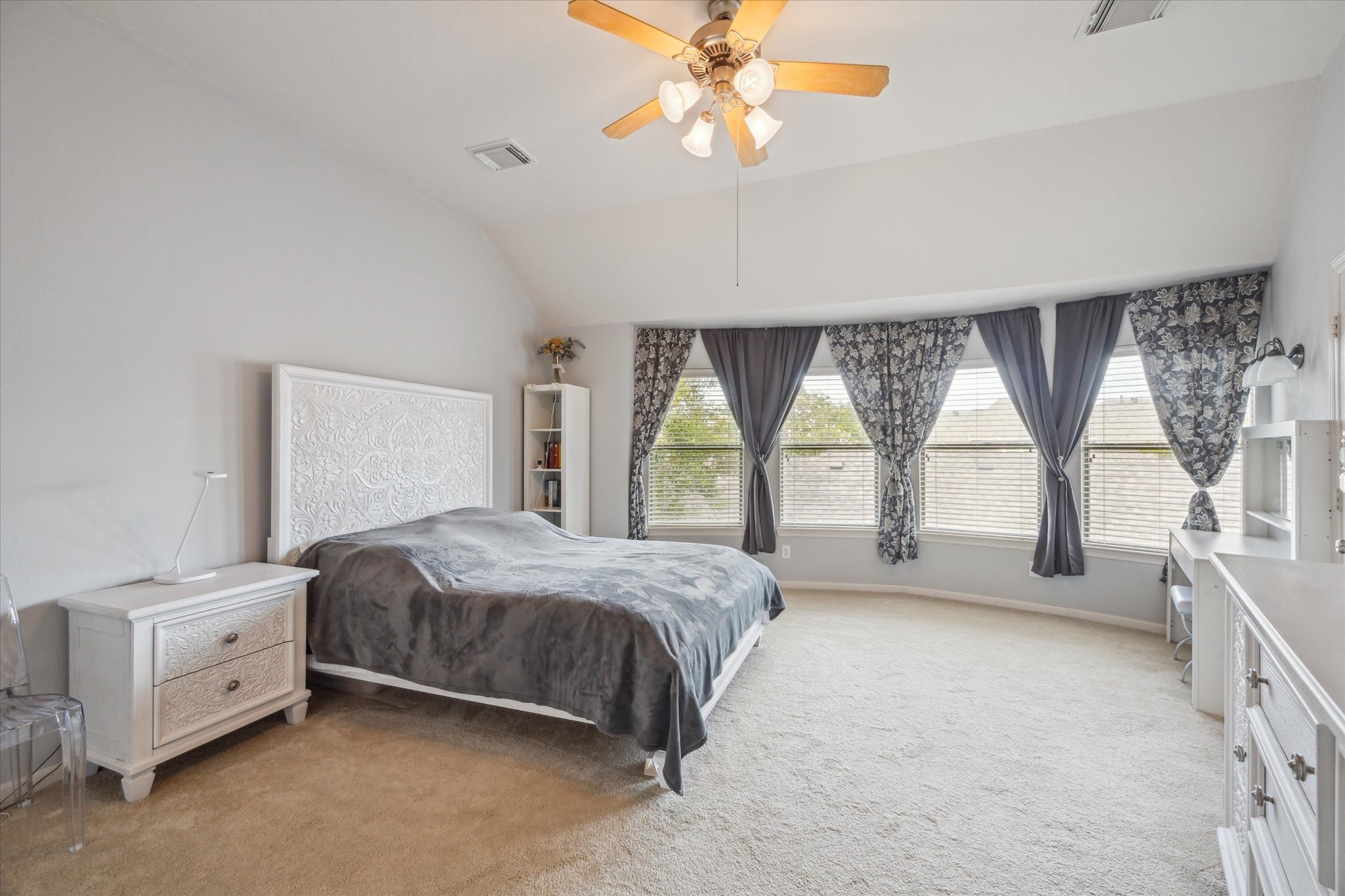 2403 Clippers Square Houston, TX 77058 - Photo 12 of 20 a spacious bedroom with a bed and a large window