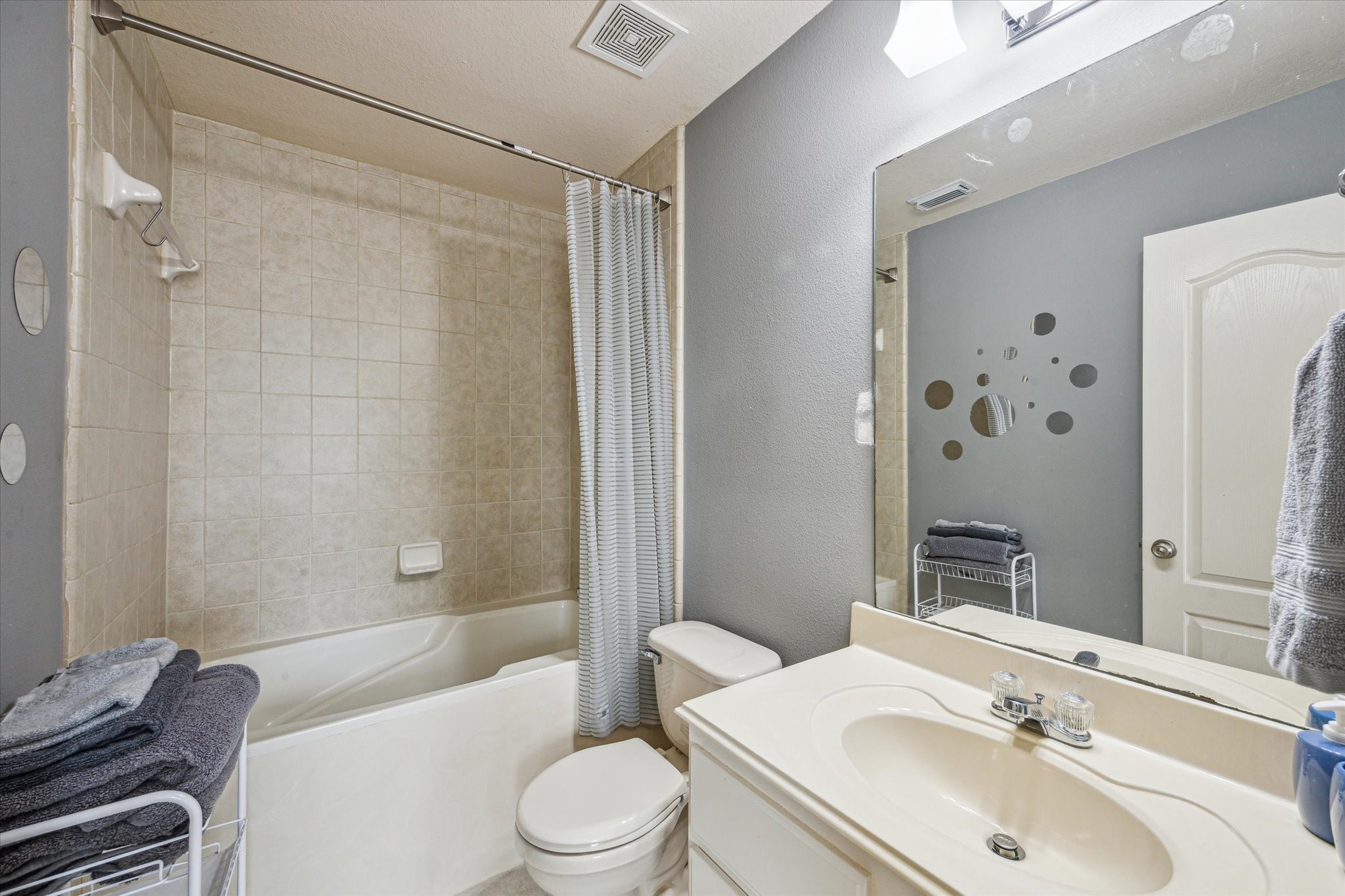 2403 Clippers Square Houston, TX 77058 - Photo 16 of 20 a bathroom with a sink a toilet and shower