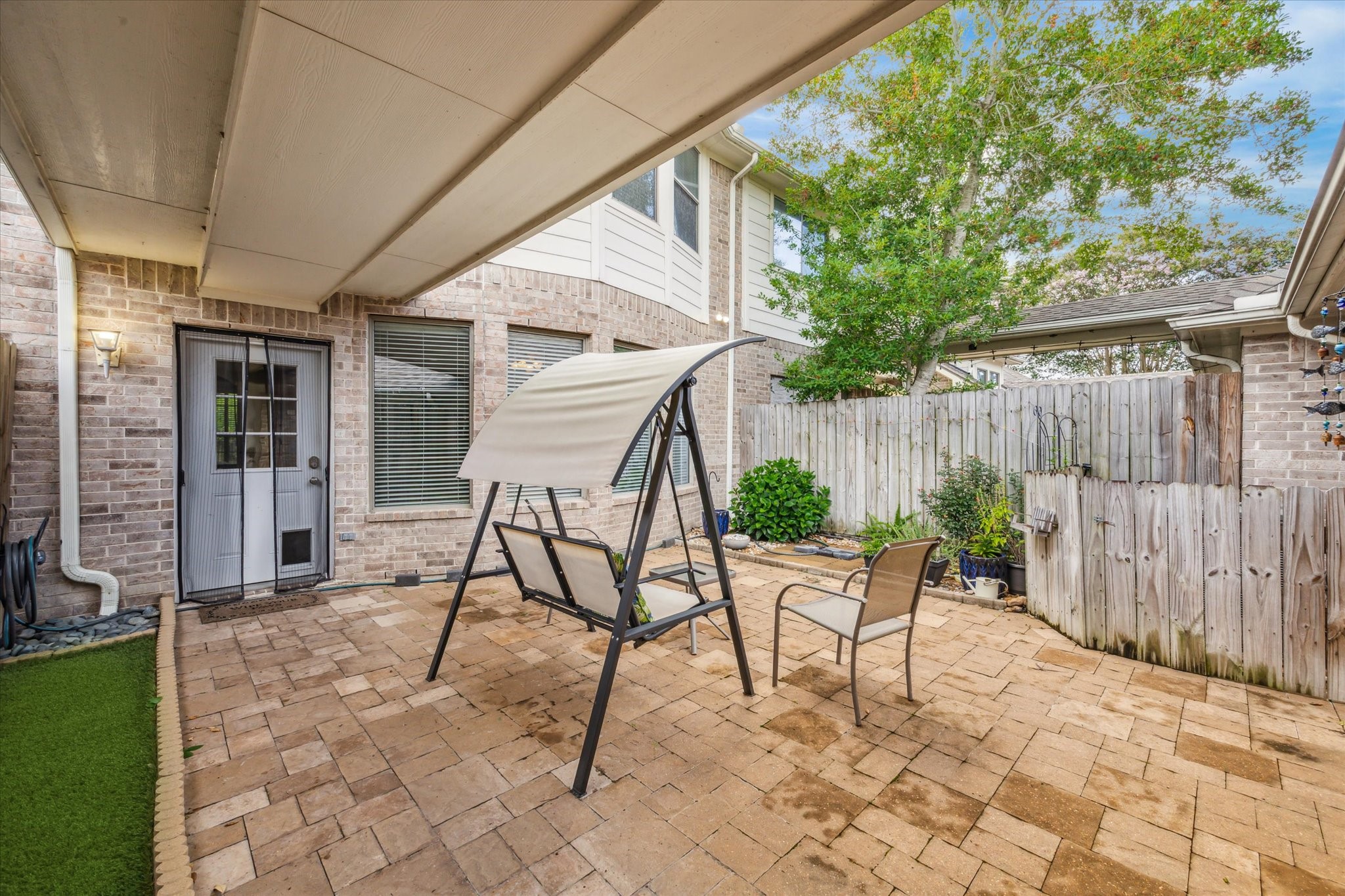 2403 Clippers Square Houston, TX 77058 - Photo 17 of 20 a view of a patio with a table and chairs